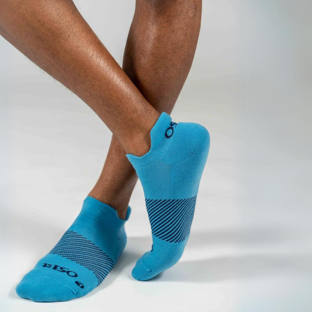 Man wearing Carolina blue Wicked Comfort sock | OS1st
