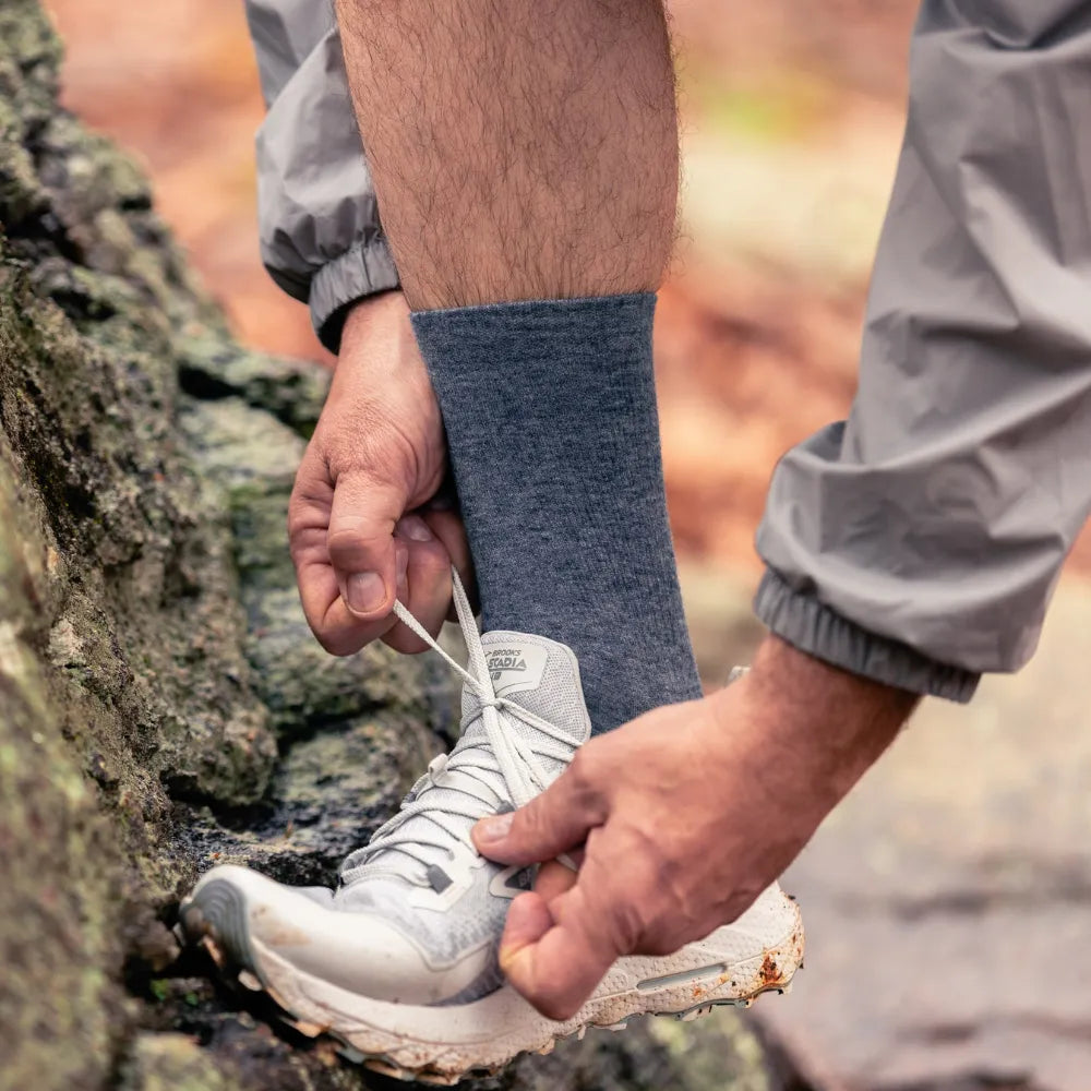 trail runner wearing merino wool wicked comfort socks, crew, grey | OS1st