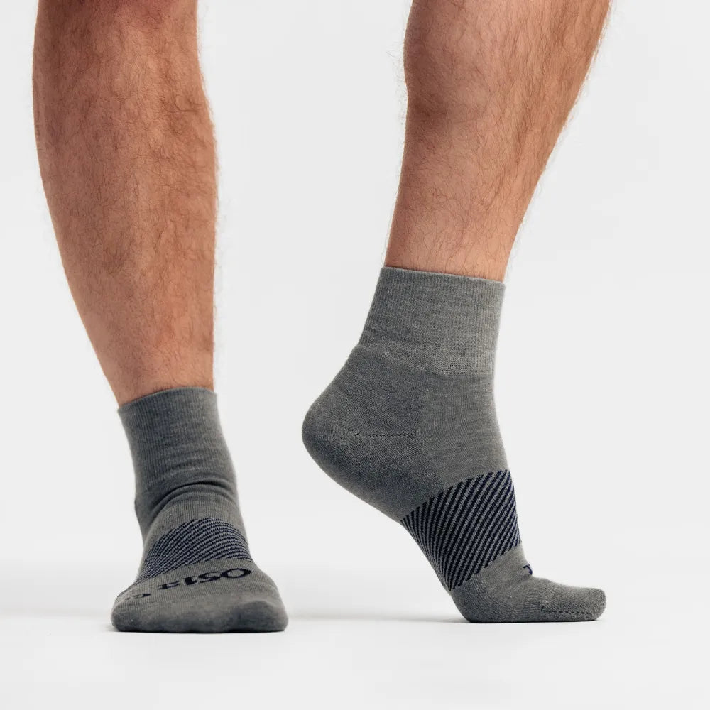 model wearing merino wool wicked comfort socks, quarter crew, grey | OS1st