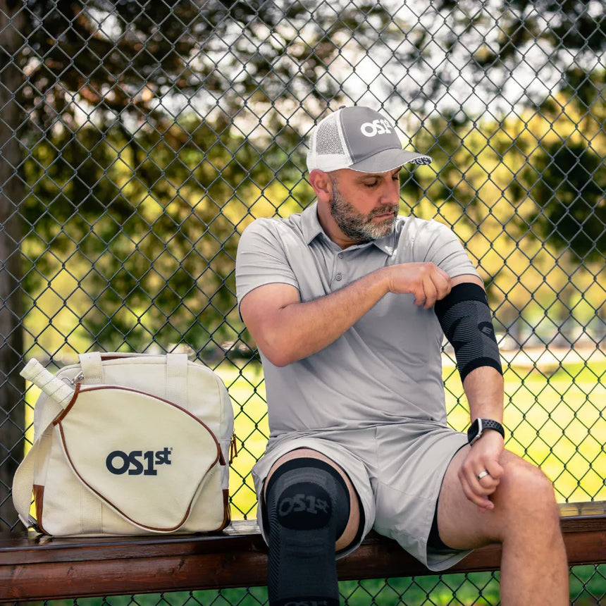 Pickleball athlete wearing es6 elbow brace and KS7 knee sleeve | OS1st