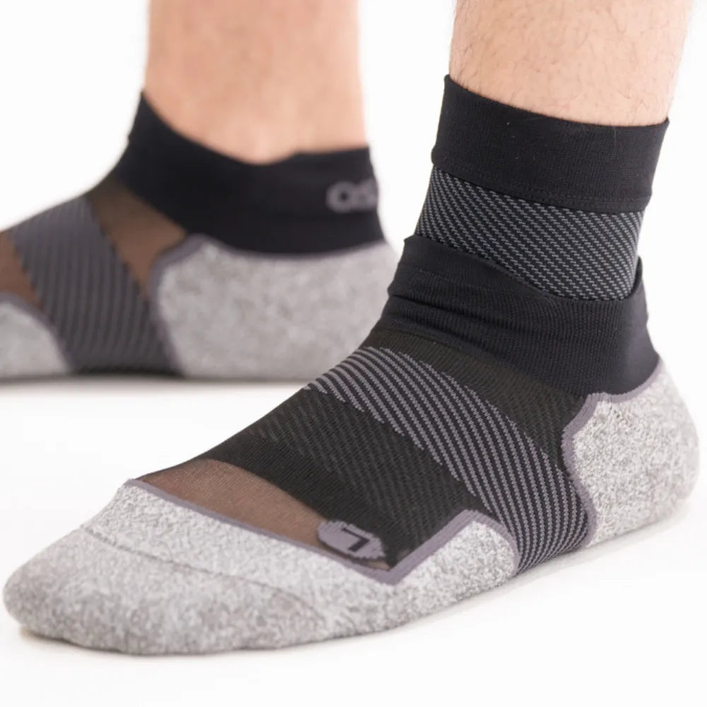 Person wearing black active comfort socks in no show and fs6 black plantar fasciitis sleeve | OS1st