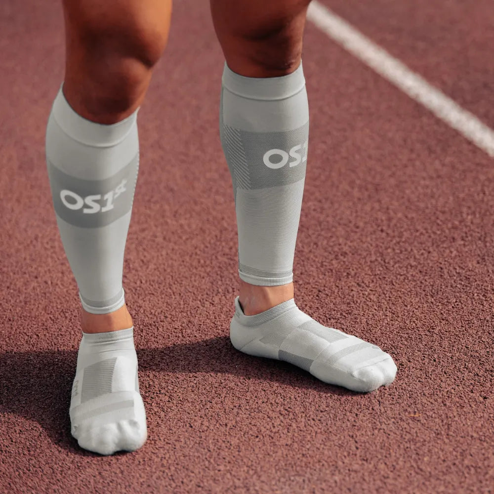 athlete wearing thin air performance socks and sleeves in grey | OS1st