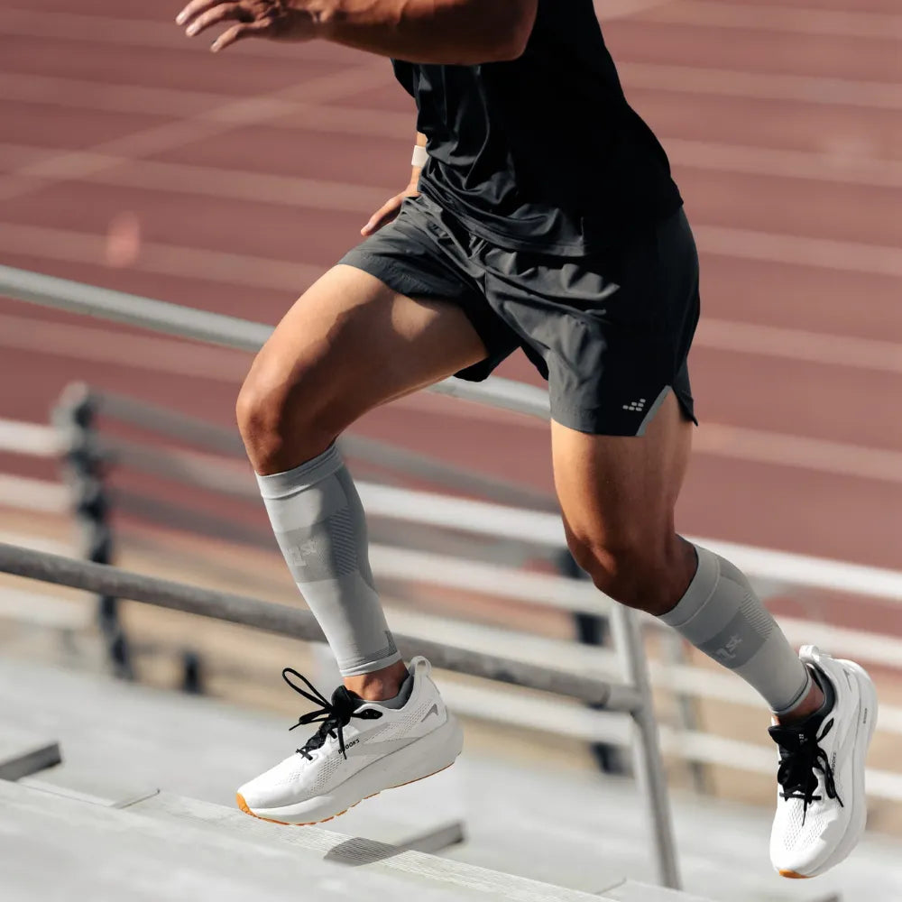 athlete wearing thin air performance socks and sleeves in grey | OS1st