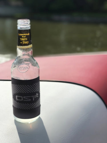 the OS1st beverage sleeve being used on a boat | OS1st