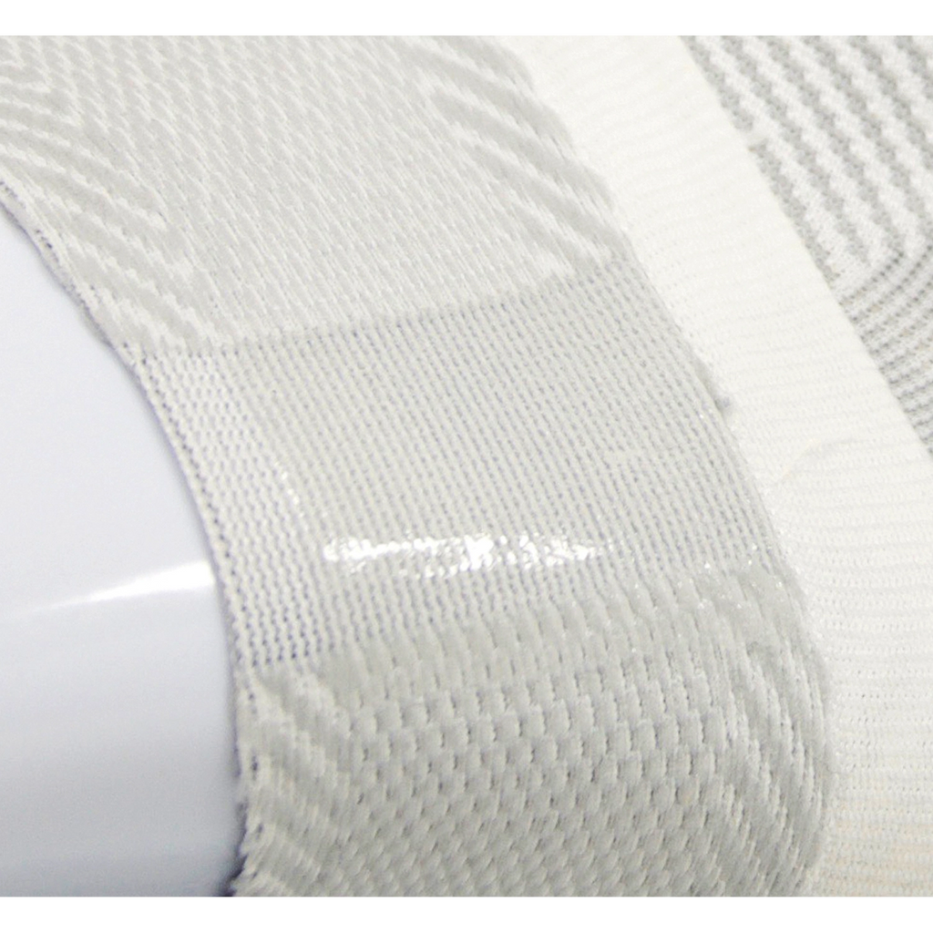 DS6 Night time plantar fasciitis treatment sleeve closeup showing the hypoallergenic silicone grip that keeps the sleeve in place | OS1st