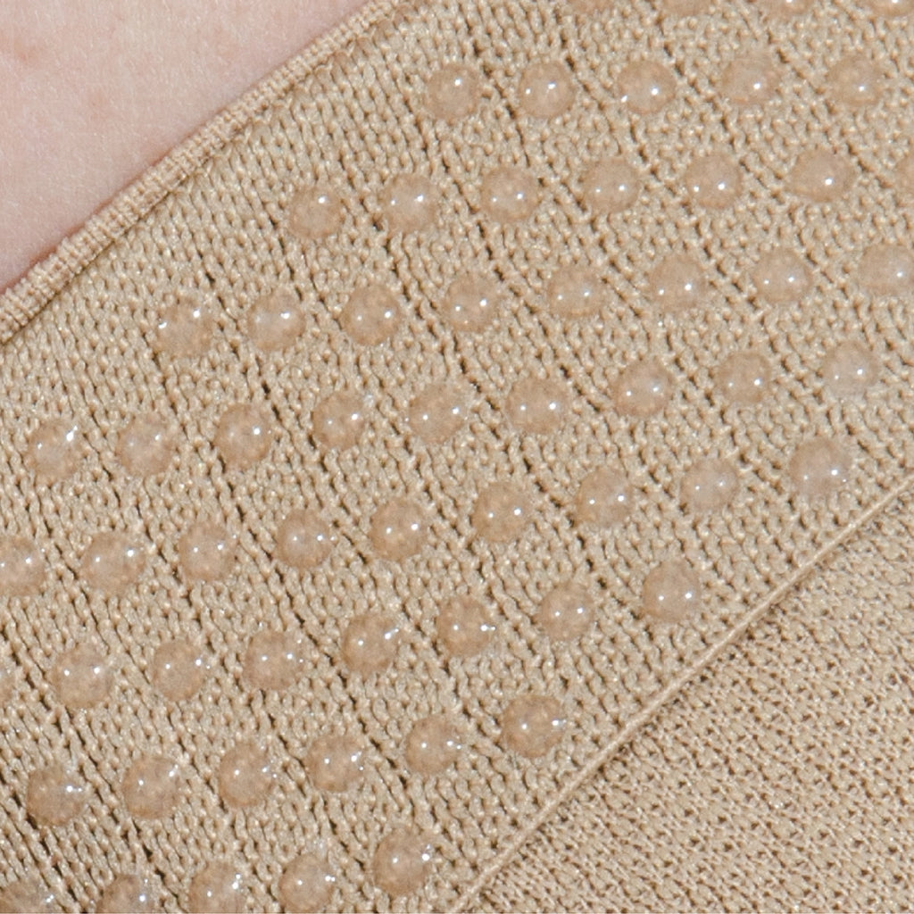 HV3 Bunion Bracing Sleeve closeup showing the hypoallergenic silicon gel grips that keep the sleeve in place | OS1st