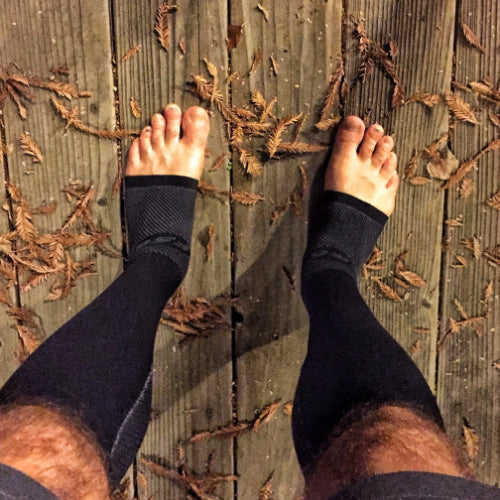 a person wearing a pair of the black FS6+ performance foot and calf sleeves | OS1st