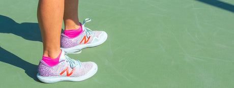 OS1st pickleball socks shown on a pickleball player