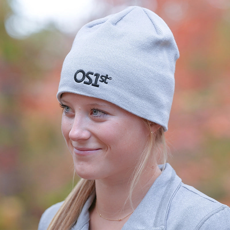 Woman wearing grey OS1st beanie | OS1st