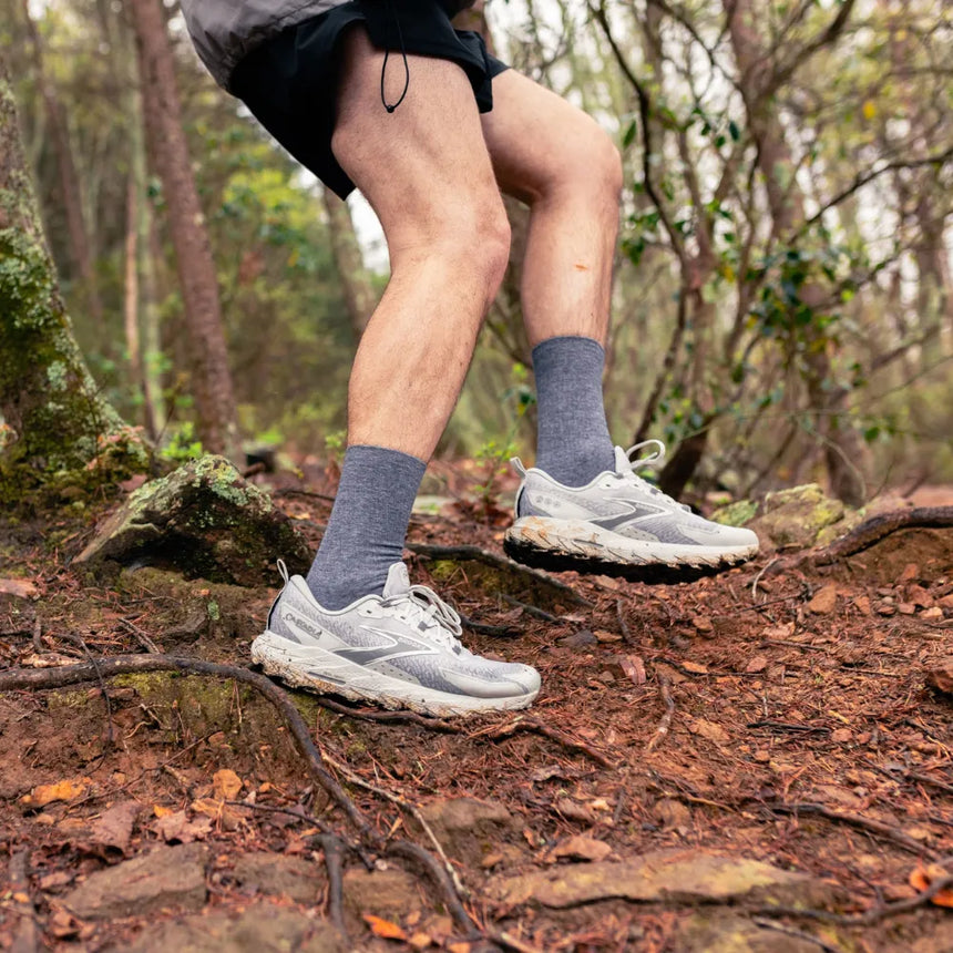 trail runner wearing merino wool wicked comfort socks, crew in grey | OS1st