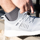man wearing charcoal quarter crew active comfort socks | OS1st