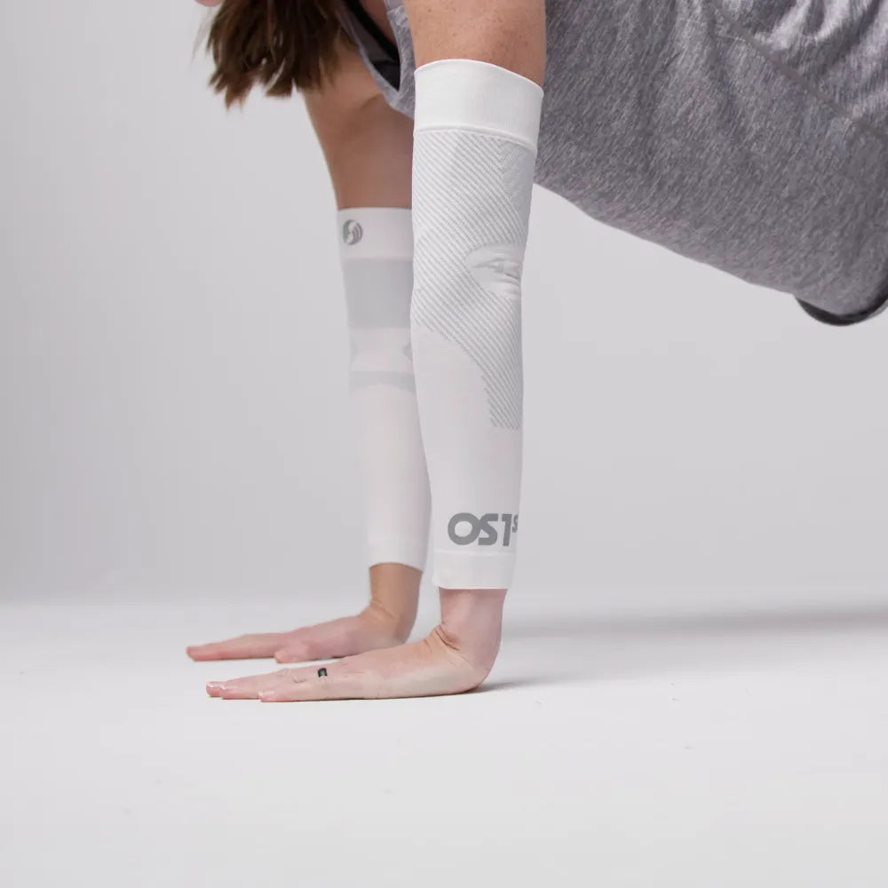 Person wearing white as6 arm sleeves while doing push ups | OS1st