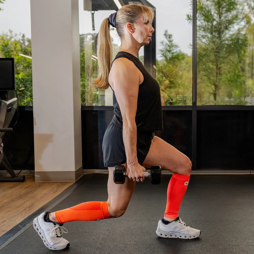 #color_orange fusion
athlete wearing orange cs6 calf sleeves while working out | OS1st
