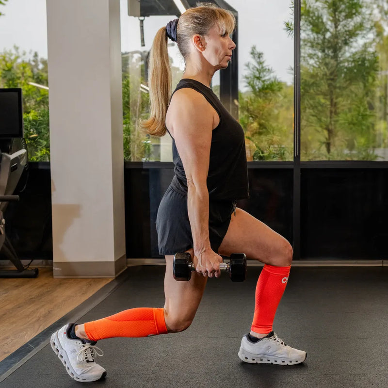 #color_orange fusion
athlete wearing orange cs6 calf sleeves while working out | OS1st