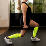 #color_reflector yellow
athlete wearing reflector yellow cs6 calf sleeves while working out | OS1st