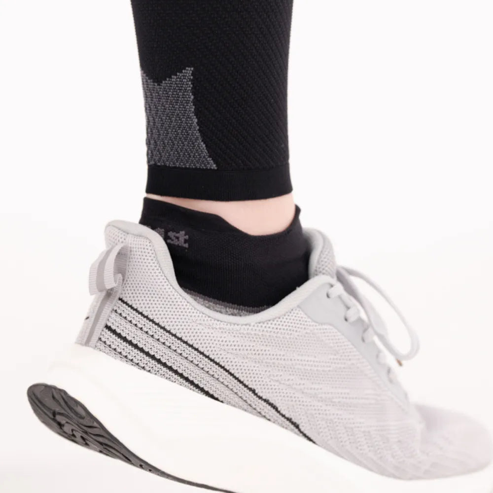 bottom back of cs6 calf sleeves showing compression zones and pairing with active comfort socks | OS1st