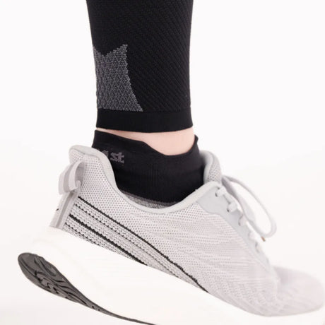 bottom back of cs6 calf sleeves showing compression zones and pairing with active comfort socks | OS1st