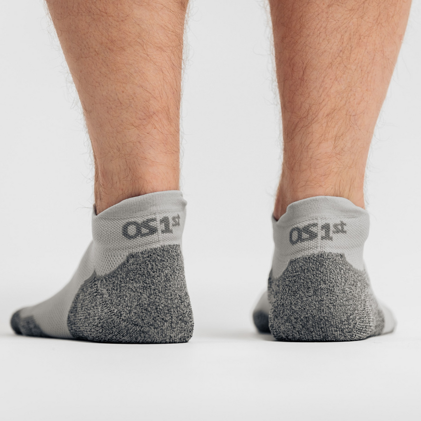 studio photo of person wearing grey dermasox | OS1st