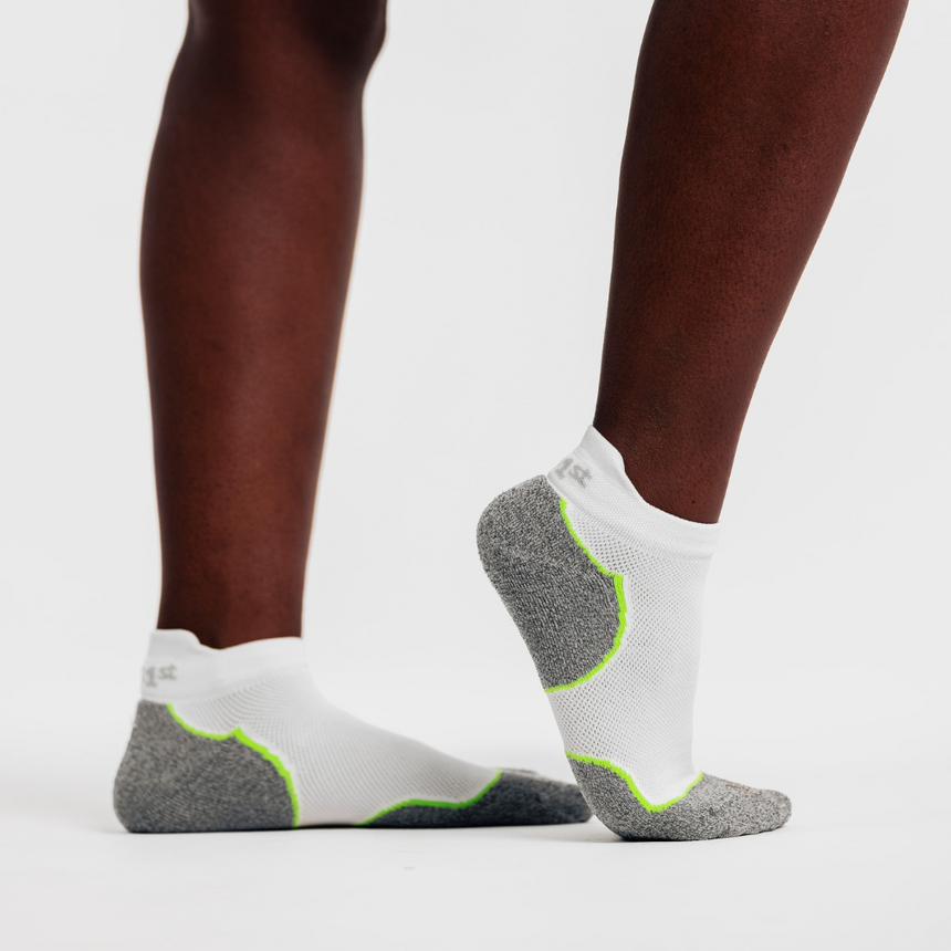 studio photo of person wearing white dermasox | OS1st