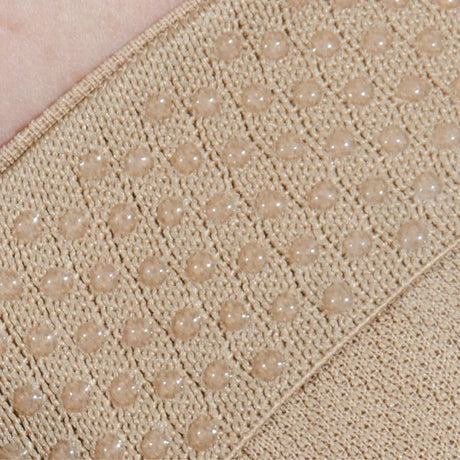 Close up of inside of HV3 bunion brace showing silicone anti slip dots | OS1st