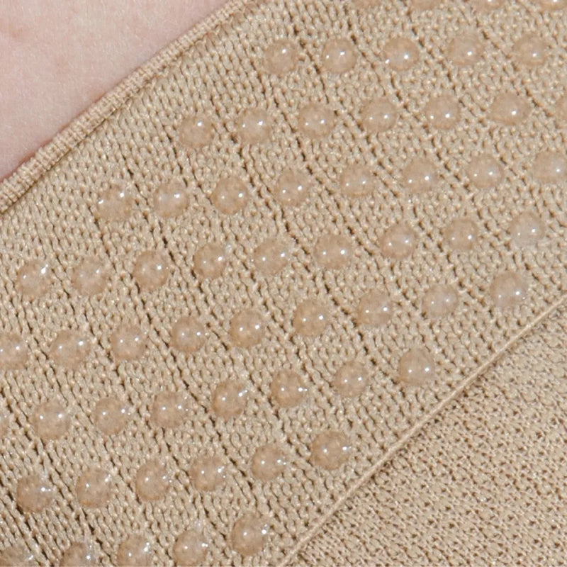 Close up of inside of HV3 bunion brace showing silicone anti slip dots | OS1st