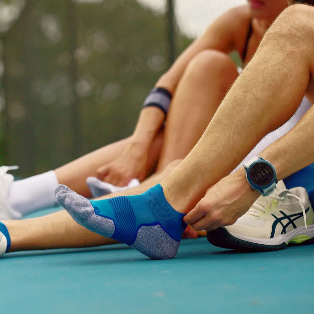 pickleball athlete wearing blue pickleball socks | OS1st
