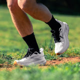 Runner wearing black crew plantar fasciitis socks | OS1st