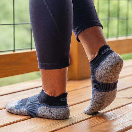 woman wearing navy no show wellness performance socks | OS1st