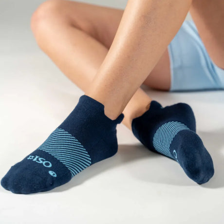 woman wearing navy wicked comfort socks, no show/ankle height | OS1st 
