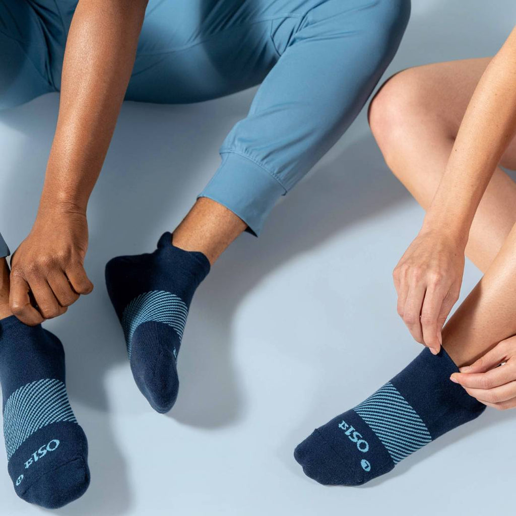 people wearing navy wicked comfort socks | OS1st