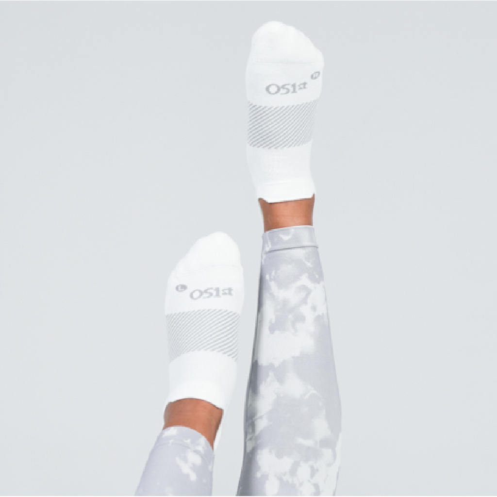 Woman wearing white Wicked comfort sock | OS1st