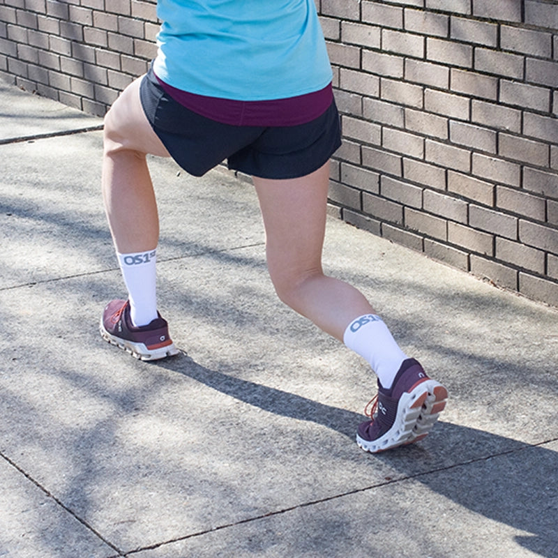Person working out while wearing the Active Comfort Socks crew length in white | OS1st