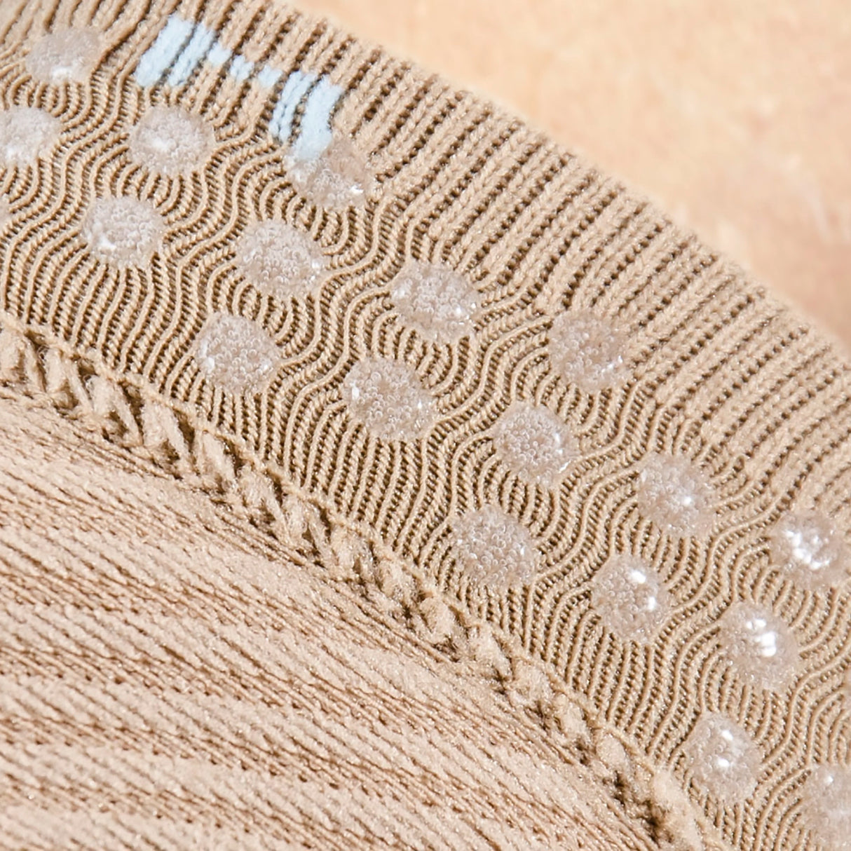 FS3 Forefood Sleeve closeup showing the hypoallergenic silicon grips that keep the sleeve in place | OS1st