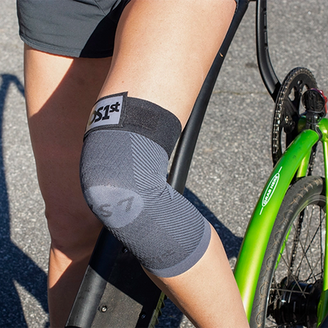Person wearing the KS7+ while riding a bike | OS1st