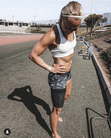 Woman wearing the QS4 performance quad sleeve | OS1st
