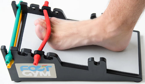 person using the foot gym